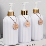 Trio Elegance™ – Dispensadores de Sabonete, Shampoo e Condicionador
