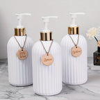 Trio Elegance™ – Dispensadores de Sabonete, Shampoo e Condicionador
