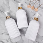 Trio Elegance™ – Dispensadores de Sabonete, Shampoo e Condicionador